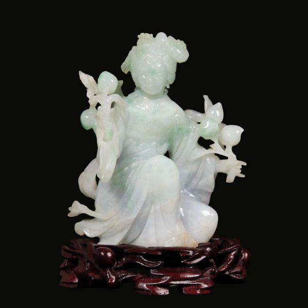 



A JADEITE CARVING OF A FEMALE FIGURE, CHINA, LATE QING DYNASTY, 19TH/20TH CENTURY