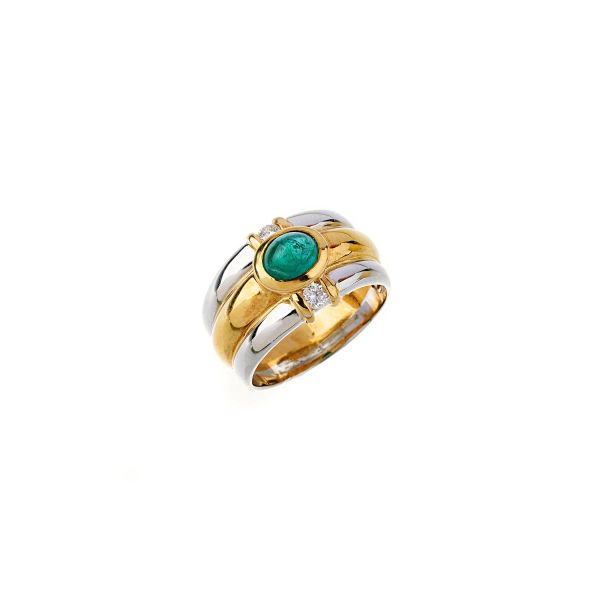 



EMERALD AND DIAMOND BAND RING IN 18KT TWO TONE GOLD