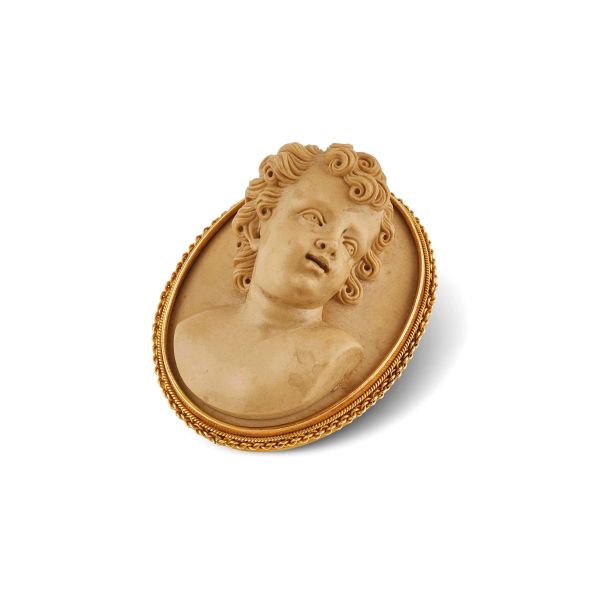 LAVA STONE CARVING BROOCH IN 18KT YELLOW GOLD