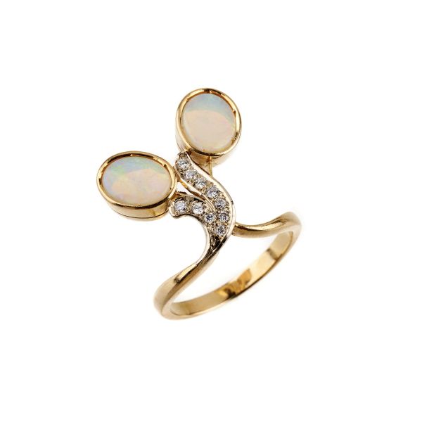 



OPAL DOUBLET CONTRARIE RING IN 18KT YELLOW GOLD