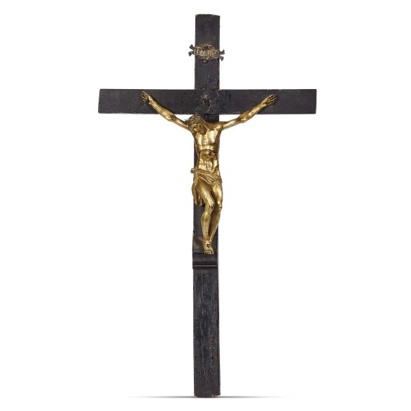 Cast from a model attribuited to Giambologna, early 17th century, Crucified Christ, gilt bronze assembled on ebonised wooden cross, 25x20 cm (Christ)