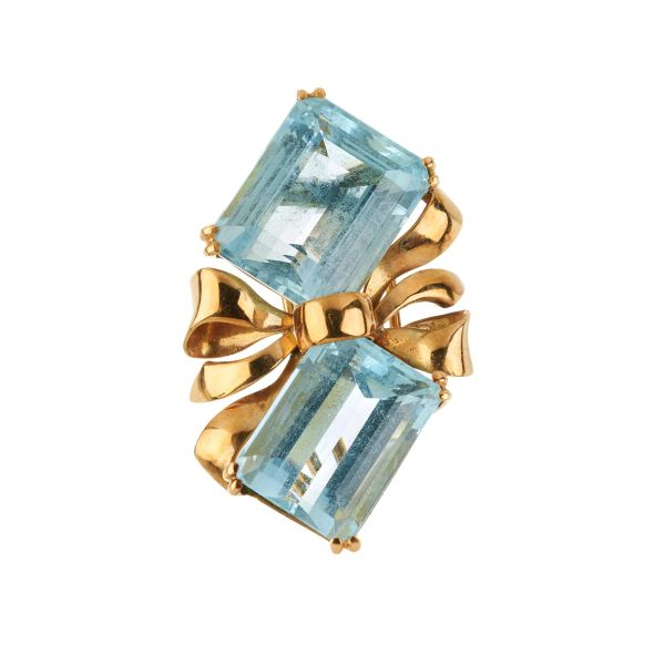 



AQUAMARINE RIBBON-SHAPED BROOCH IN 18KT YELLOW GOLD