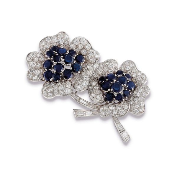 



FLOWER-SHAPED BROOCH WITH DIAMONDS AND SAPPHIRES