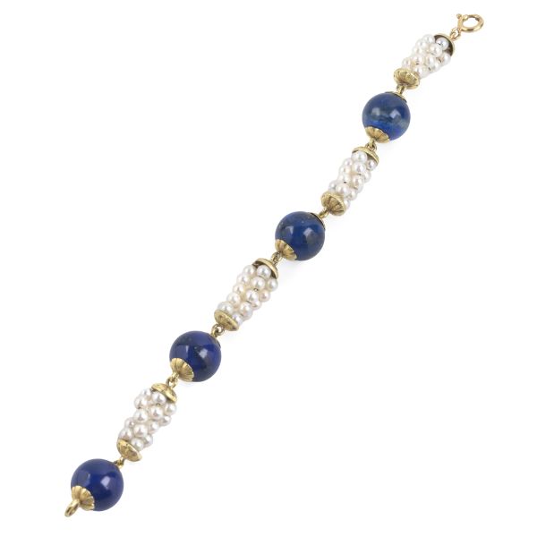 



LAPIS LAZULI AND CULTURED PEARL BRACELET IN 18KT YELLOW GOLD