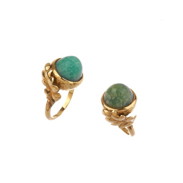 



TWO SMALL TURQUOISE RINGS IN 18KT YELLOW GOLD