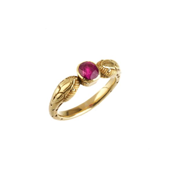 SNAKE-SHAPED RUBY RING IN 18KT YELLOW GOLD