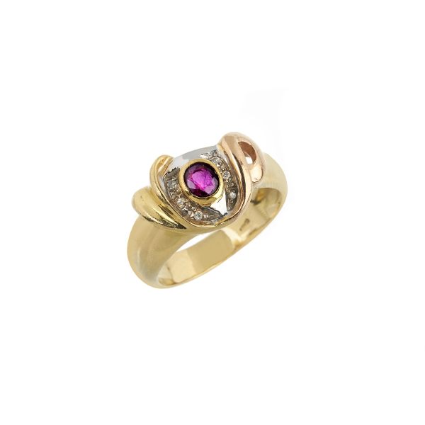 RUBY AND DIAMOND BAND RING IN 18KT TWO TONE GOLD