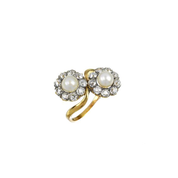 



PEARL AND DIAMOND FLORAL RING IN 18KT TWO TONE GOLD 