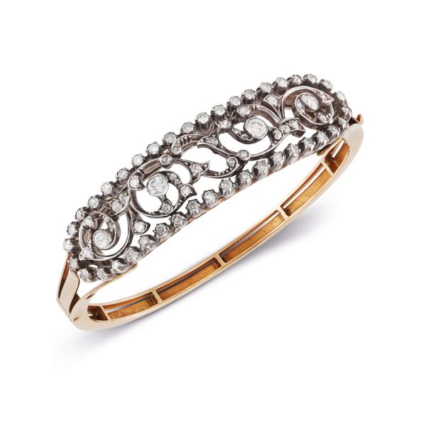 



DIAMOND BANGLE BRACELET IN GOLD AND SILVER 