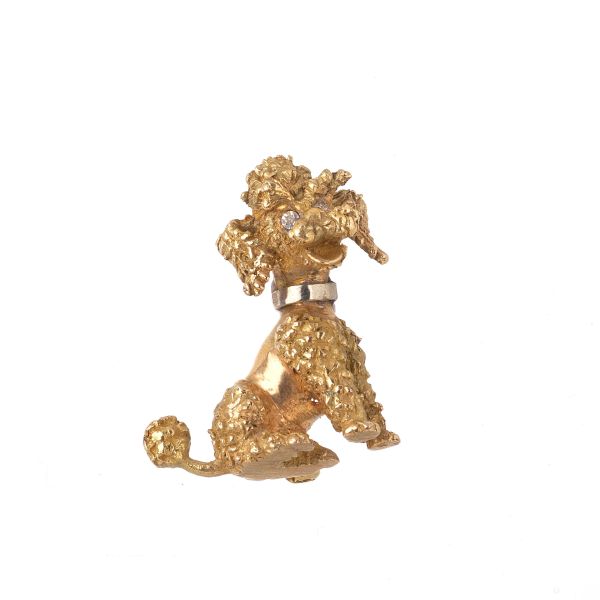 POODLE-SHAPED BROOCH IN 18KT TWO TONE GOLD