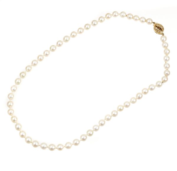 



GOLD AND PEARLS NECKLACE
