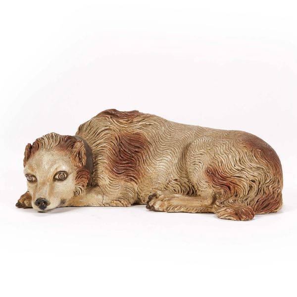 



A CROUCHING DOG, NAPLES, 18TH/19TH CENTURY