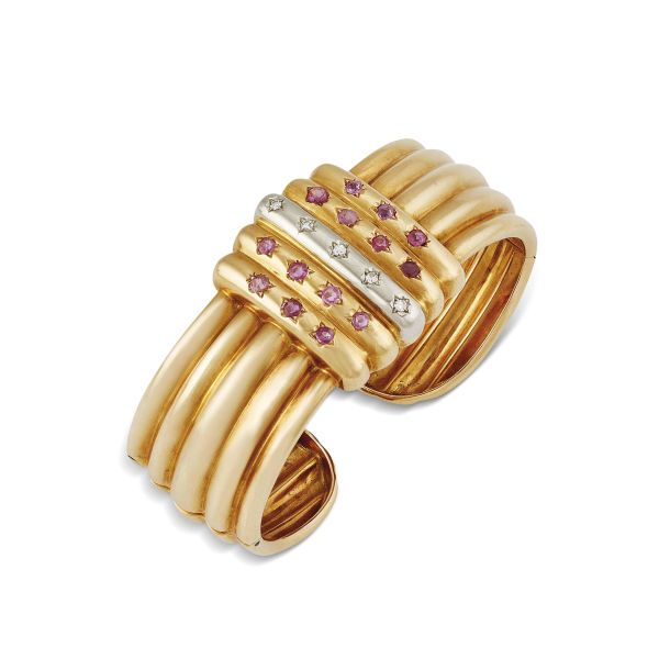 



RUBY AND DIAMOND BANGLE BRACELET IN 18KT TWO TONE GOLD