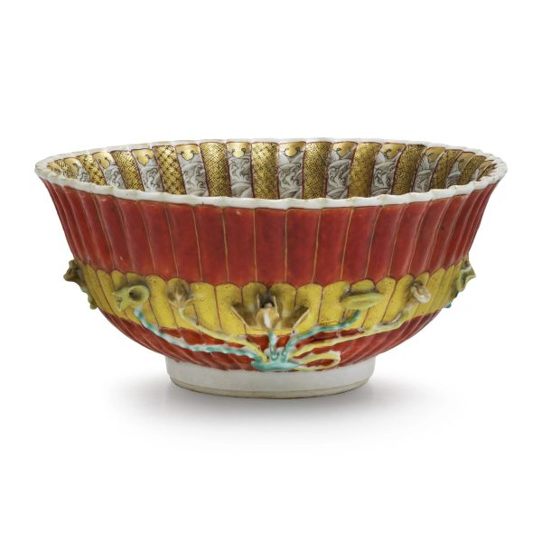 



A RELIEF-DECORATED AND POLYCHROME-ENAMELLED PORCELAIN BOWL, CHINA, QING DYNASTY, 18TH CENTURY, QIANLONG PERIOD
