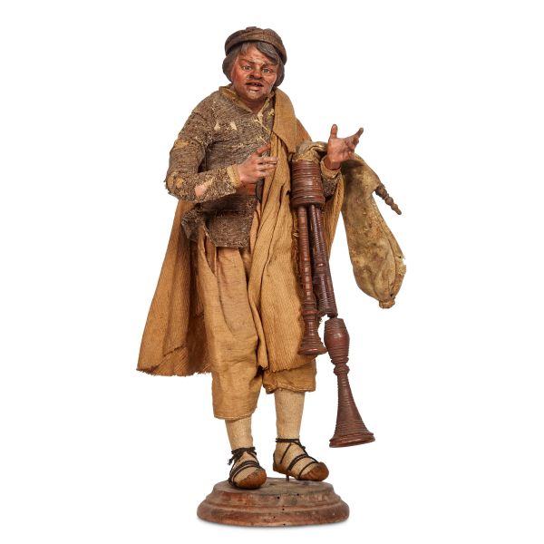 



A RUSTIC PIPER, NAPLES, 18TH CENTURY