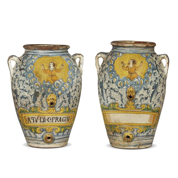 A PAIR OF SPOUTED PHARMACY JARS, MONTELUPO, CIRCA 1620-1640