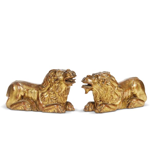 Venetian, 18th century, A pair of lions, gilt wood,16x31x10 cm
