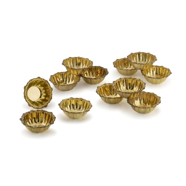 TWELVE GILDED SILVER WASHING-UP BOWLS AND TWELVE SAUCERS, 20TH CENTURY