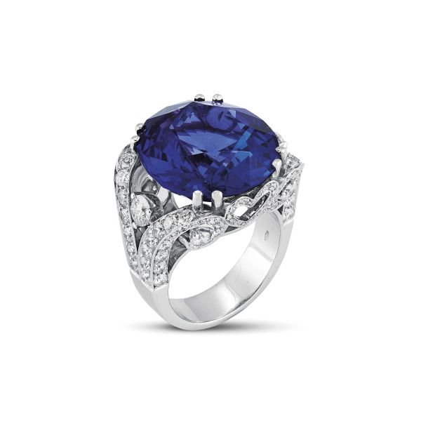 



TANZANITE AND DIAMOND RING IN 18KT WHITE GOLD
