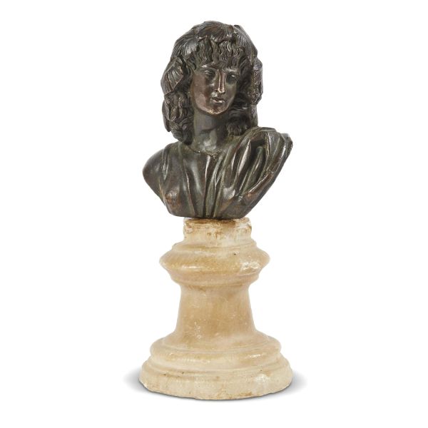Neoclassical period, A bust of Bacchus, bronze on an alabaster base 17x8,5x8 cm