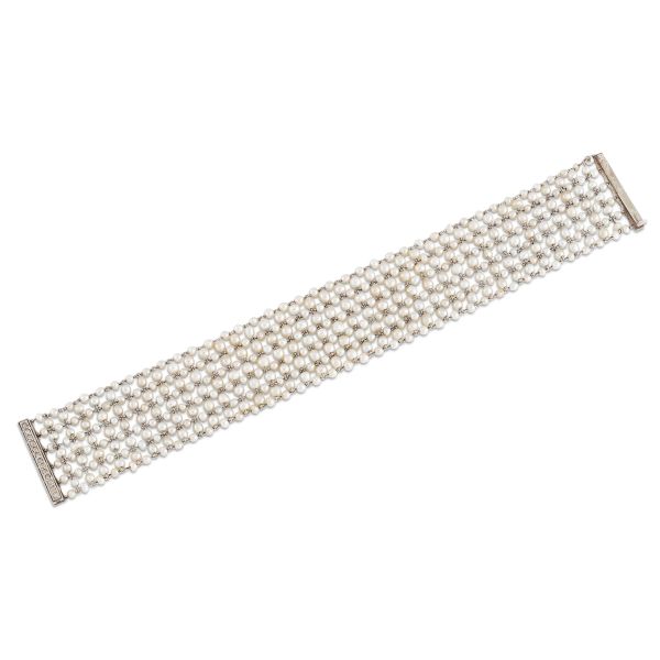 



PEARL MESH BRACELET IN PLATINUM