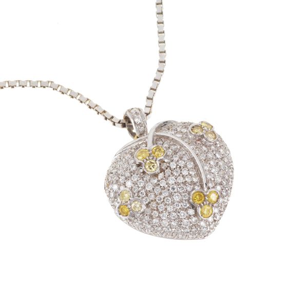 18KT WHITE GOLD NECKLACE WITH A HEART-SHAPED DIAMOND PENDANT IN 18KT TWO TONE GOLD
