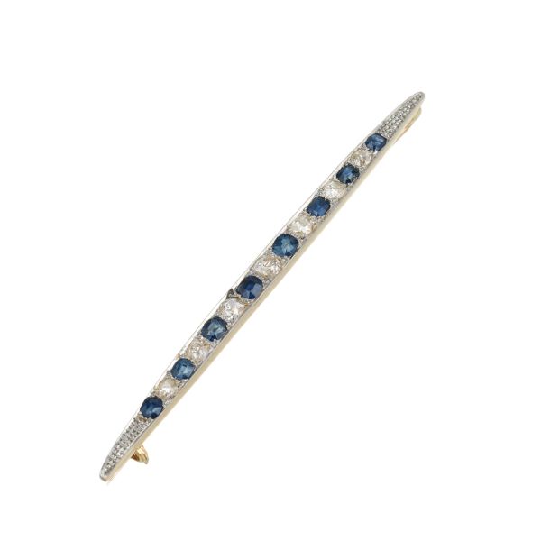 SAPPHIRE AND DIAMOND BARRETTE BROOCH IN 18KT YELLOW GOLD AND SILVER