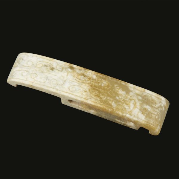 A WHITE JADE BUCKLE, CHINA, MING DYNASTY, 16TH-17TH CENTURIES