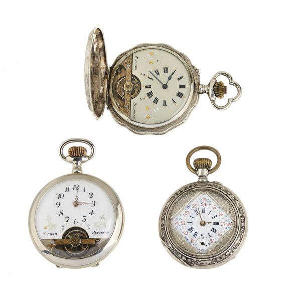 



THREE SILVER AND METAL POCKET WATCHES