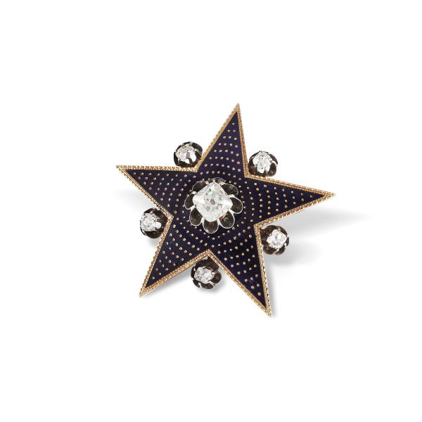 DIAMOND STAR BROOCH IN GOLD AND SILVER