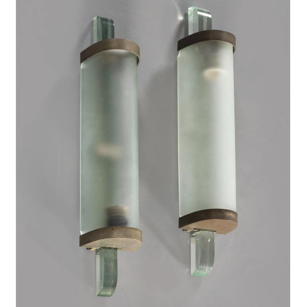 



A COUPLE OF METAL AND GLASS APPLIQUES