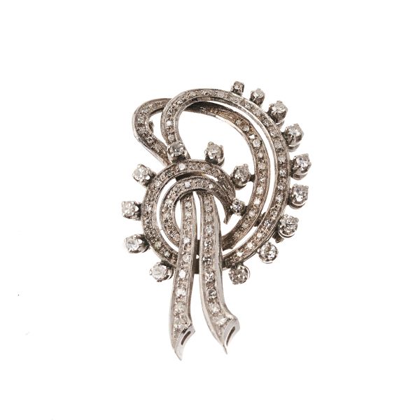 



DIAMOND RIBBON BROOCH IN 18KT WHITE GOLD