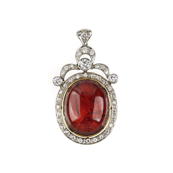 



GARNET AND DIAMOND PENDANT IN 14KT TWO TONE GOLD