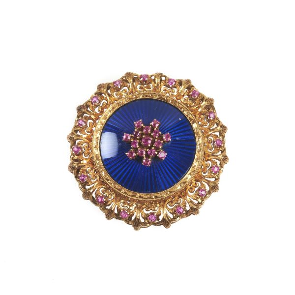 



ROUND-SHAPED RUBY BROOCH IN 18KT YELLOW GOLD