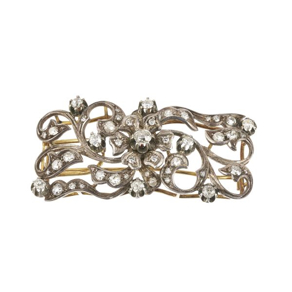 



DIAMOND FLOWERING BRANCH BROOCH IN GOLD AND SILVER 