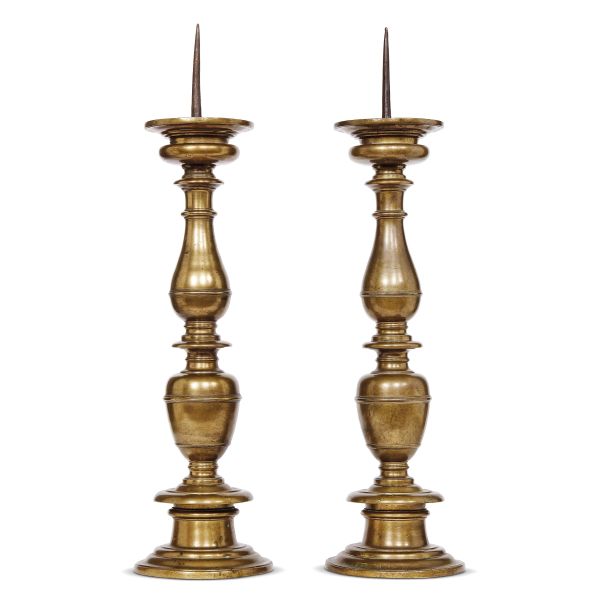 A PAIR OF TUSCAN CANDLESTICKS, 17TH CENTURY