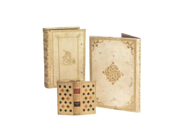 (Legature)   Lotto di 3 opere in belle legature in pergamena decorata. XVII-XVIII secolo.