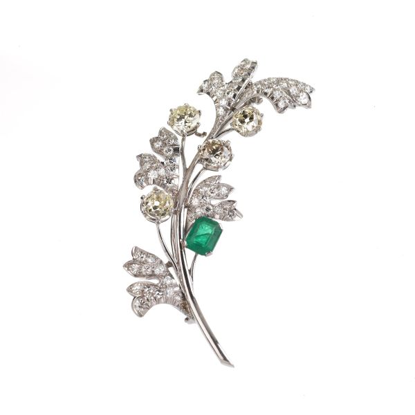FLOWRING BRANCH EMERALD AND DIAMOND BROOCH IN 18KT WHITE GOLD