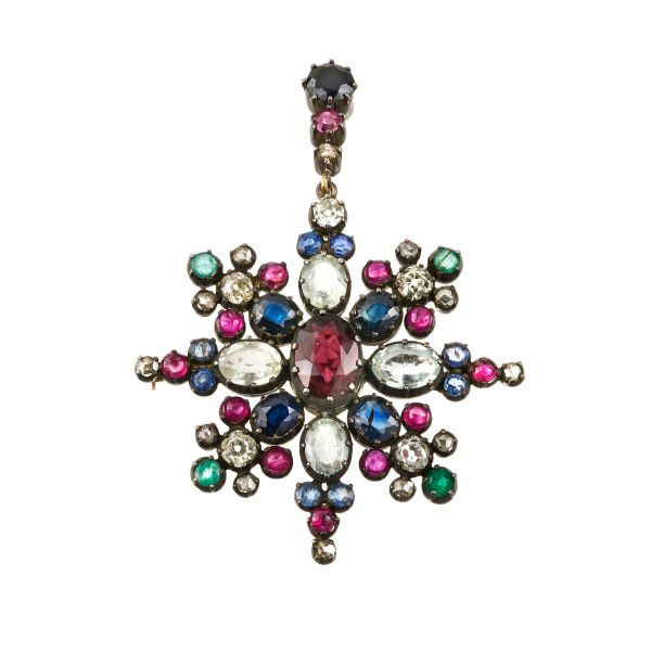 



SPILLA CON PIETRE SINTETICHE E DIAMANTI