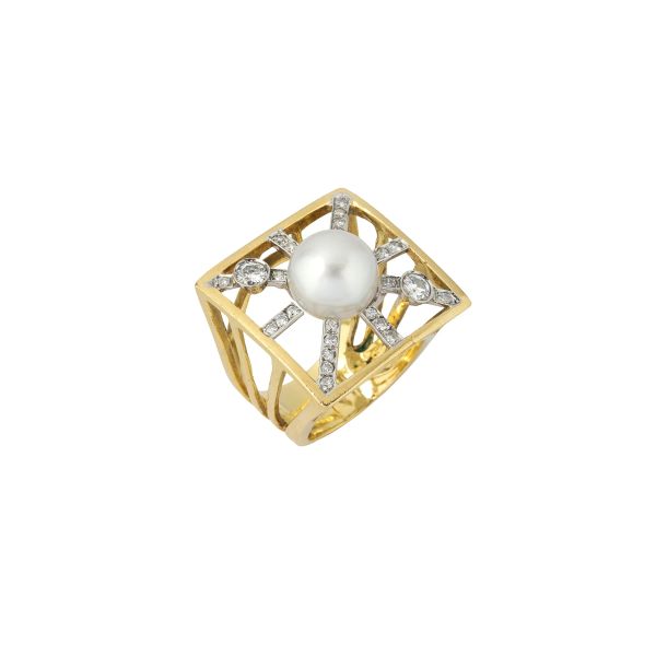 



GRANDE ANELLO CON DIAMANTI E PERLA
