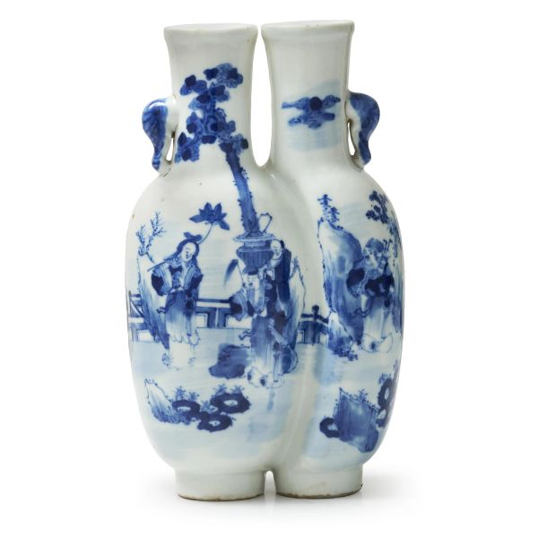 



A BLUE AND WHITE PORCELAIN DOUBLE VASE WITH ELEPHANT HANDLES, CHINA, QING DYNASTY, 19-20TH CENTURY