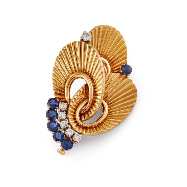 



SPILLA CON ZAFFIRI E DIAMANTI