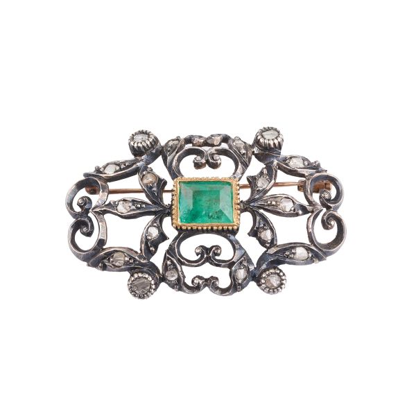 



EMERALD AND DIAMOND FLOWERING BRANCH-SHAPED BROOCH IN SILVER AND GOLD 