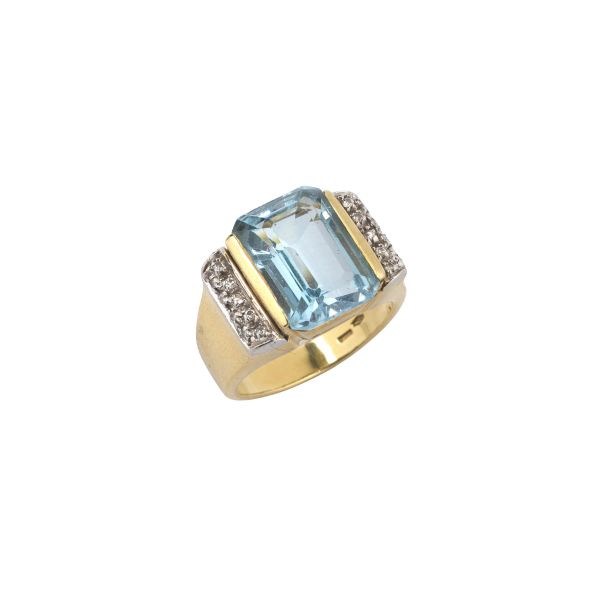 ANELLO A FASCIA CON TOPAZIO AZZURRO