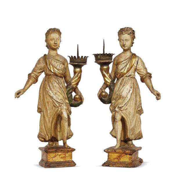 



A PAIR OF TUSCAN HOLDING ANGELS, 17TH CENTURY