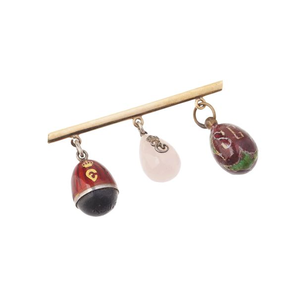 



BARRETTE BROOCH IN 14KT GOLD WITH THREE PENDANT EGGS 