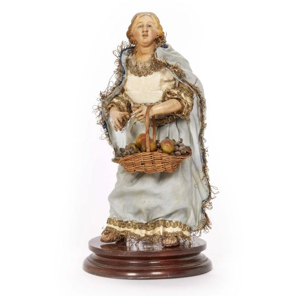A MAIDEN WITH A BASKET OF FRUIT, NAPLES, 18TH/19TH CENTURIES