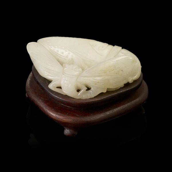 



A WHITE JADE CARVING OF A CICADA AND DRAGONFLY, CHINA, 19TH OR 20TH CENTURY 