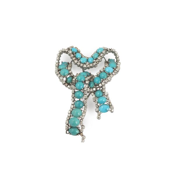 



TURQUOISE AND DIAMOND BROOCH IN 18KT WHITE GOLD