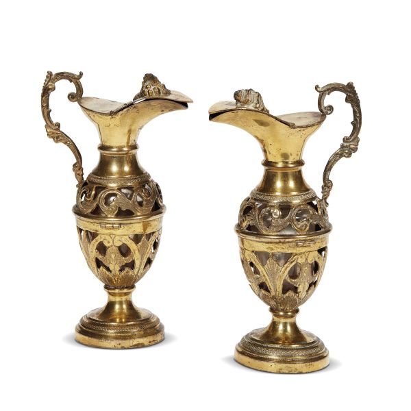 Florentine, 19th century, A pair of claret jugs, gilt bronze and glass, cm diam. base 5,5 cm